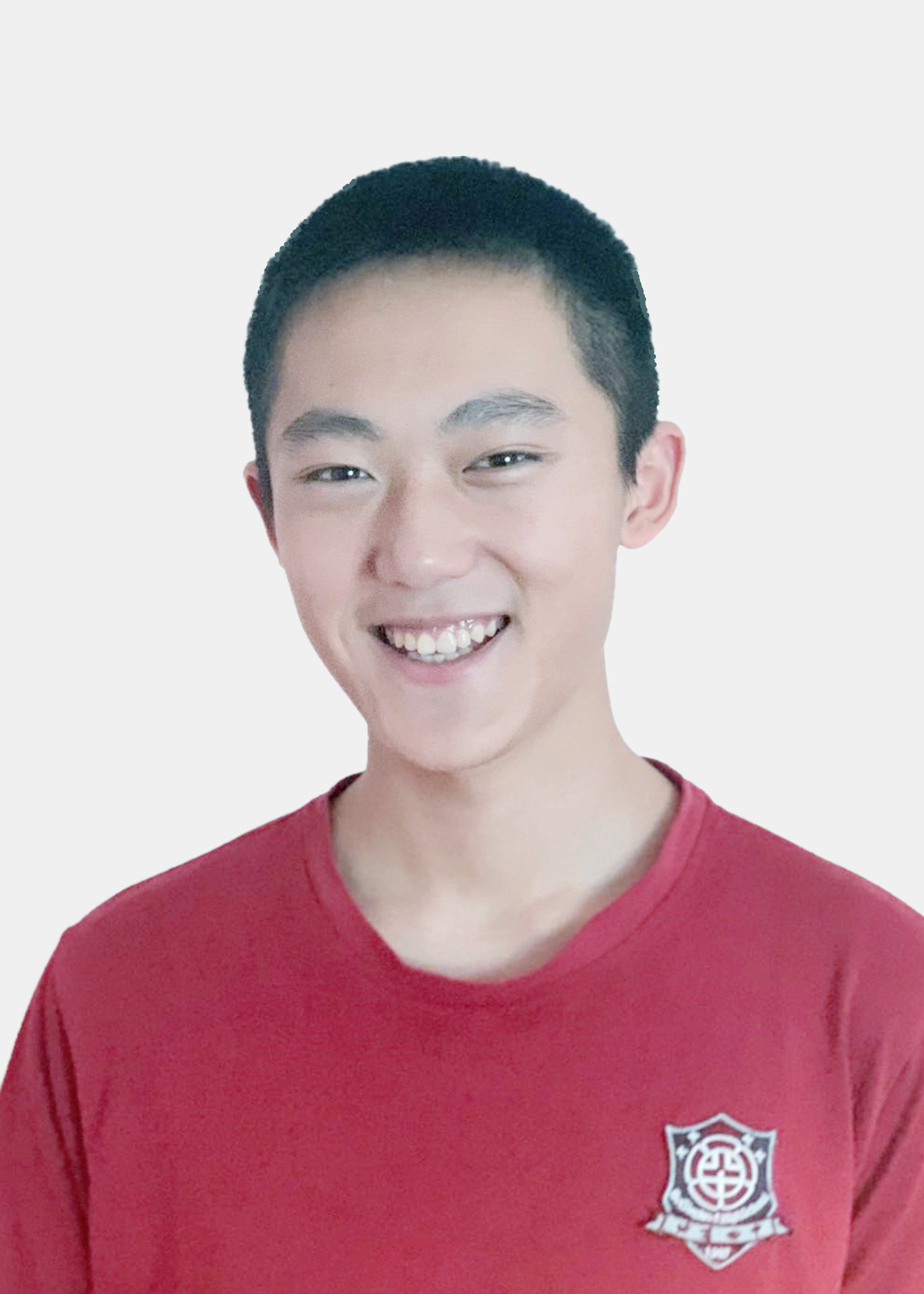 Gordon Dai smiling in a red shirt